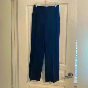 DOLCE AND GABBANA SPILT HEM SLACKS.